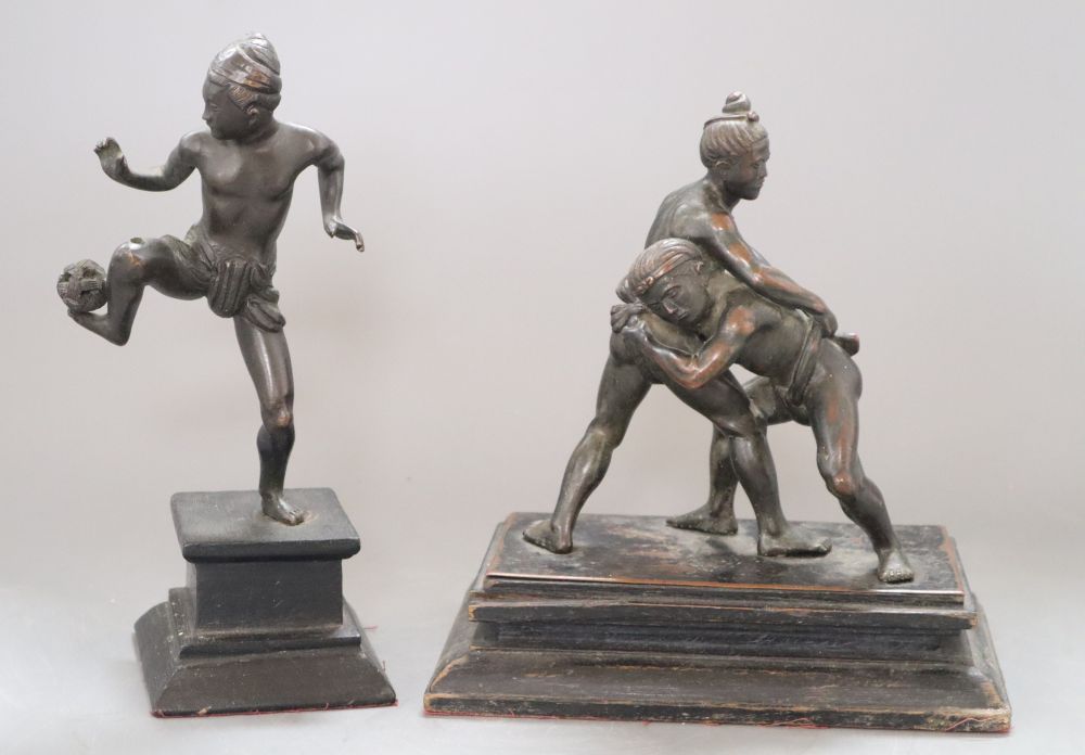 Two Malay bronzes of wrestlers and a juggler, height 21cm